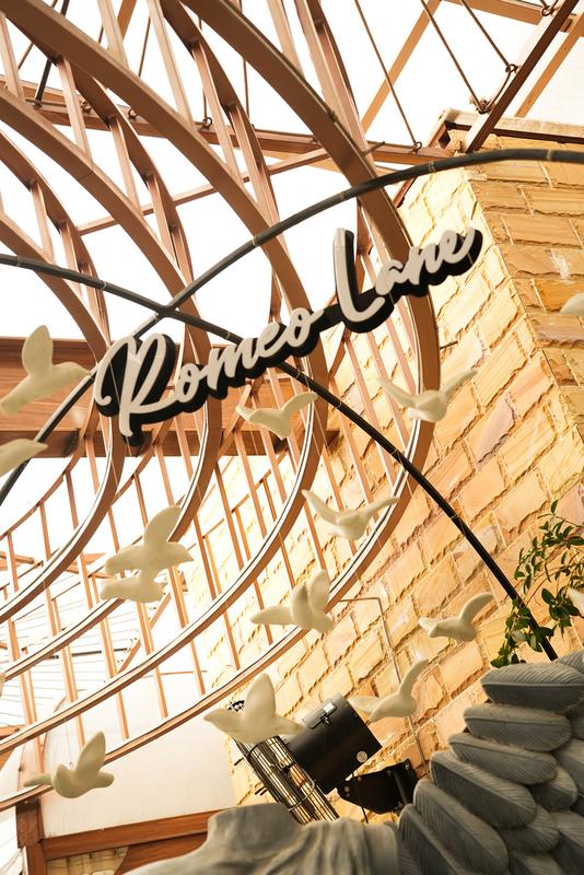 The Romeo Lane sign set into the canopy